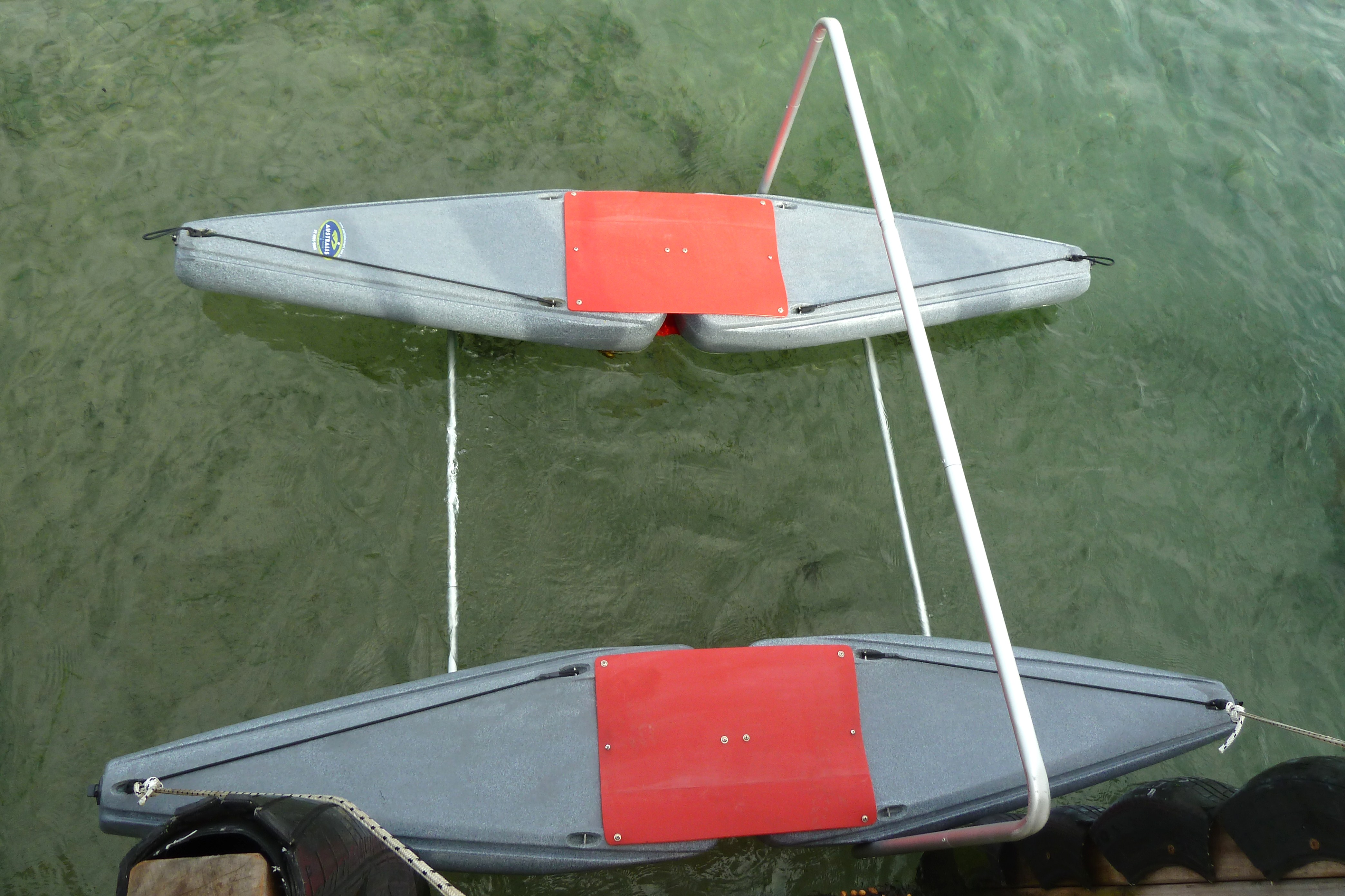 Floating Kayak Dock System For Launching Kayaks And Canoes